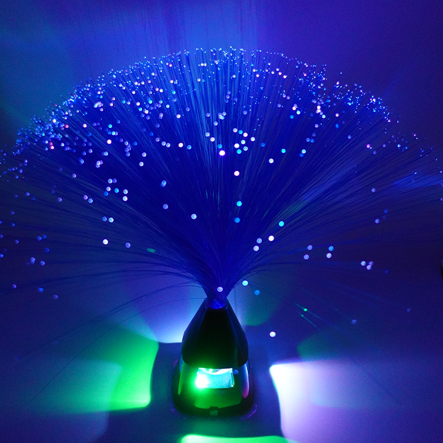 Fiber optic table lamp: Dazzling star-like glows create magical ambience. Unique light flow brings dreamy visuals, blending tech with poetic charm for any space.
